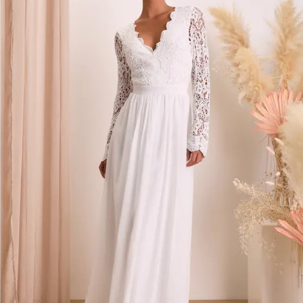 Long sleeve white floor length A line dress with open back 🤍